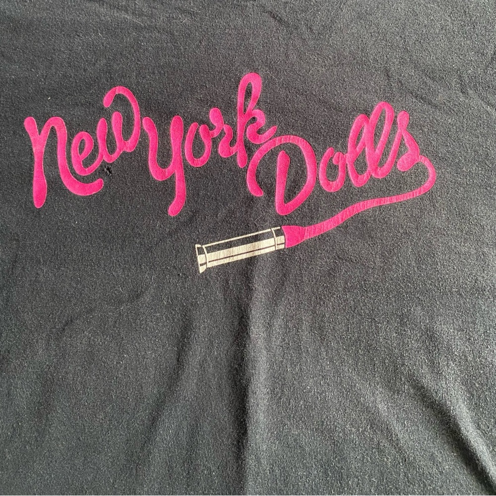 New York Dolls tee shirt.  Mens large. Pre-owned, some holes as seen in pics.
